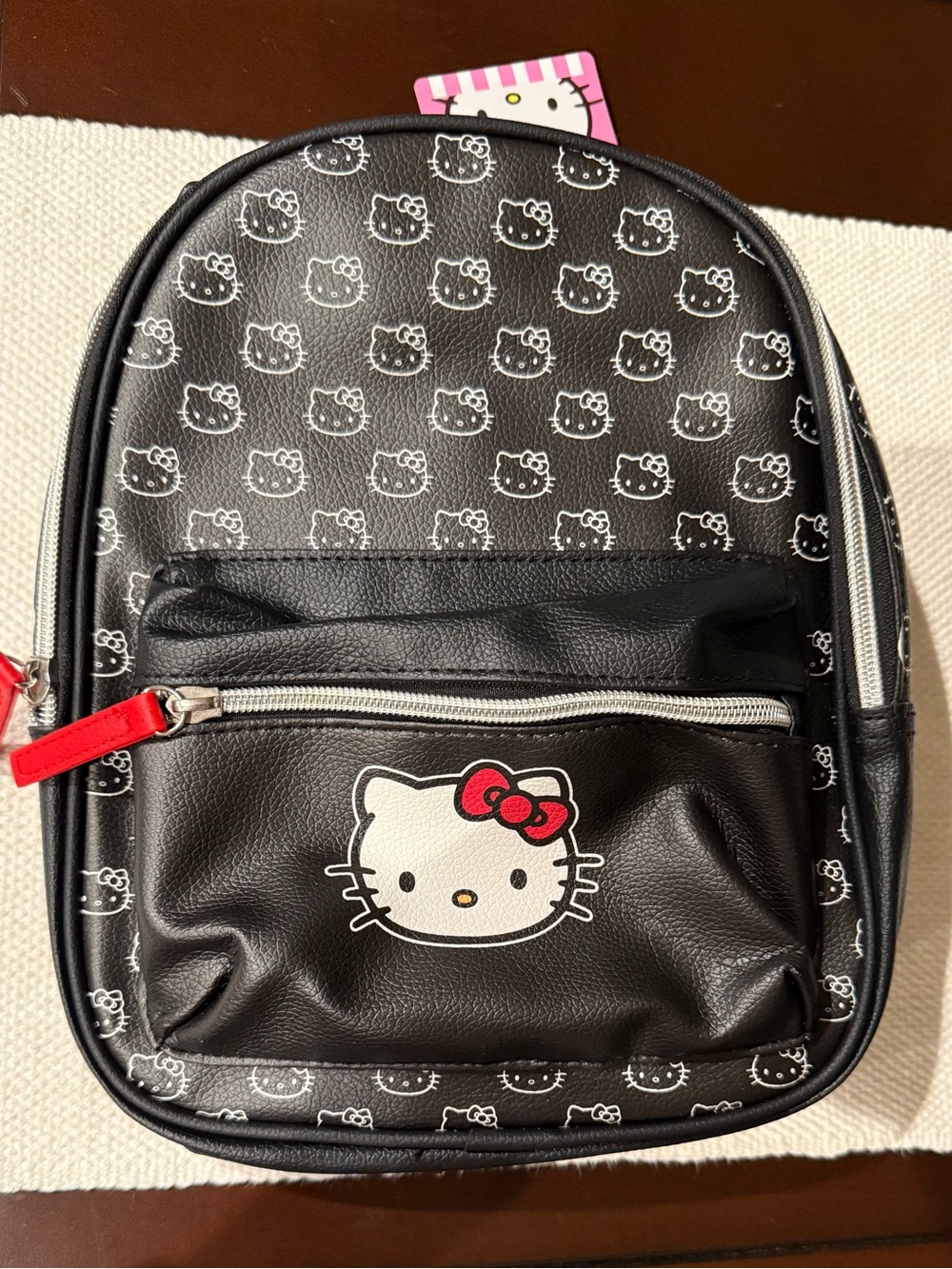 Sanrio Hello Kitty Black Faux Leather Mini Backpack with All Over Print *NWT
